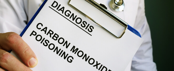 image of doctor showing a clipboard with diagnosis of Carbon Monoxide Poisioning