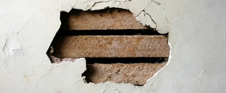 image of broken wall