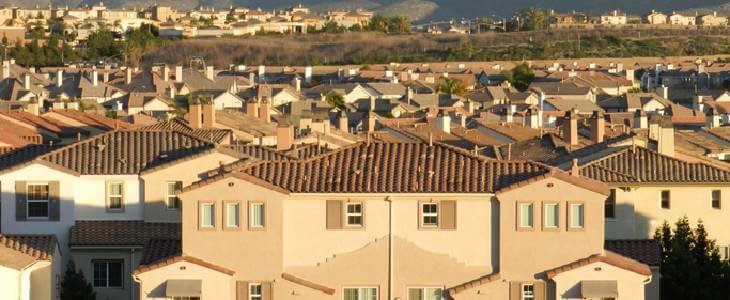 Scenic view of houses in Chula Vista, CA with mountains in the background